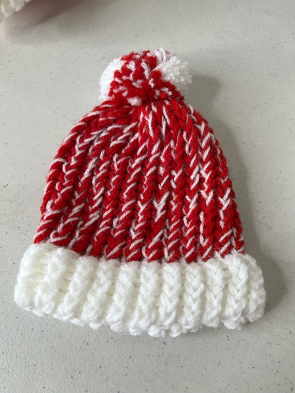 Hand-Knit Red and White Pom Pom Newborn beanie
